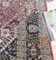 Upgrade your space with the durability and elegance of this machine-made rug.