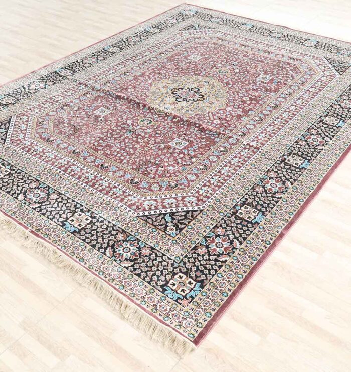 Upgrade your space with the durability and elegance of this machine-made rug.