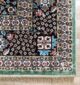 Machine-made rug featuring durable construction, stylish patterns, and easy-care design for modern homes.