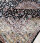Machine-made rug featuring durable construction, stylish patterns, and easy-care design for modern homes.