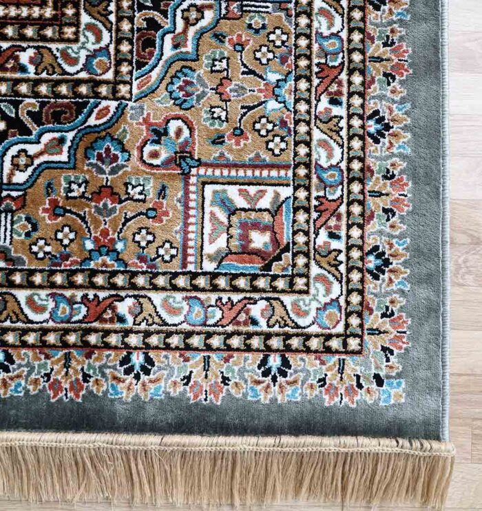 Upgrade your space with the durability and elegance of this machine-made rug.