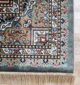 Upgrade your space with the durability and elegance of this machine-made rug.