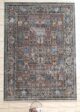 Upgrade your space with the durability and elegance of this machine-made rug.