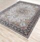 Upgrade your space with the durability and elegance of this machine-made rug.