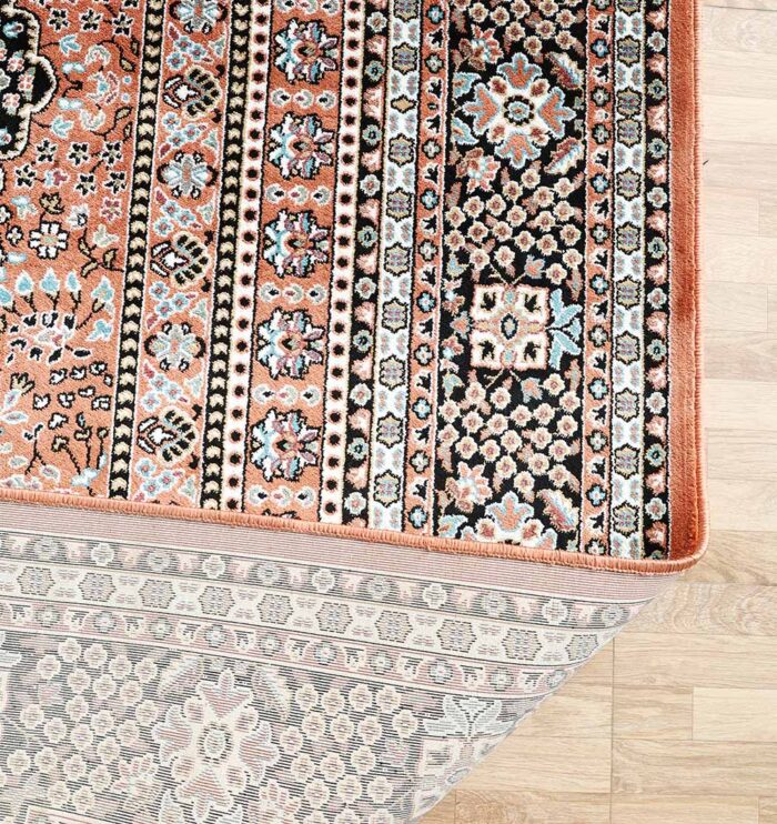 Durable machine-made rug with modern design, soft texture, and long-lasting quality for home décor.