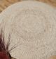 Round jute carpet for living room and bedroom, designed in a modern carpet style to suit home décor in Dubai.