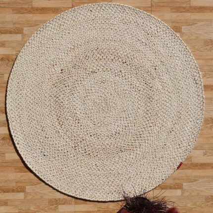 Round jute carpet for living room and bedroom, designed in a modern carpet style to suit home décor in Dubai.