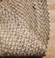 Round jute carpet for living room and bedroom, designed in a modern carpet style to suit home décor in Dubai.