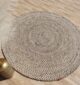 Round jute carpet for living room and bedroom, designed in a modern carpet style to suit home décor in Dubai.