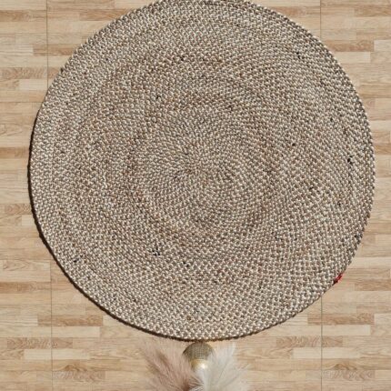 Round jute carpet for living room and bedroom, designed in a modern carpet style to suit home décor in Dubai.