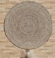 Round jute carpet for living room and bedroom, designed in a modern carpet style to suit home décor in Dubai.