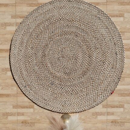 Round jute carpet for living room and bedroom, designed in a modern carpet style to suit home décor in Dubai.