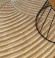 Round jute carpet for living room and bedroom, designed in a modern carpet style to suit home décor in Dubai.