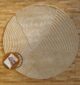 Round jute carpet for living room and bedroom, designed in a modern carpet style to suit home décor in Dubai.