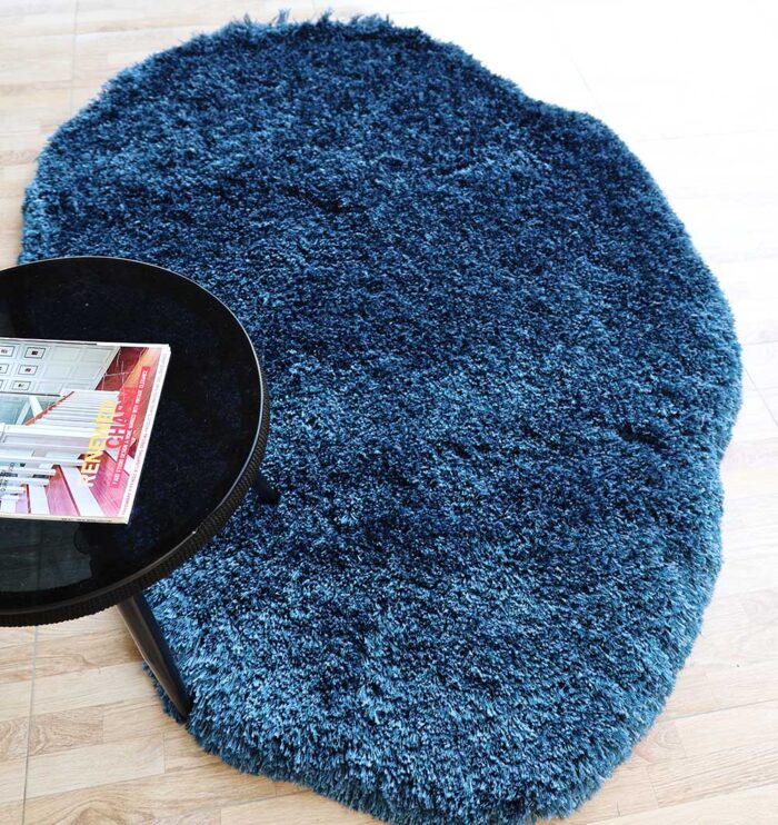 A luxurious handmade rug crafted from hand woven wool with a soft white fur texture, designed as a shag rug for modern homes in Dubai and across UAE.