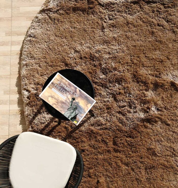 A soft handmade rug crafted from hand woven wool in India, featuring a plush white fur shag design perfect for modern homes in Dubai and across UAE.