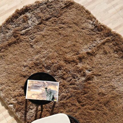 A soft handmade rug crafted from hand woven wool in India, featuring a plush white fur shag design perfect for modern homes in Dubai and across UAE.