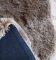 A luxurious handmade rug crafted from hand woven wool with a soft white fur texture, designed as a shag rug for modern homes in Dubai and across UAE.