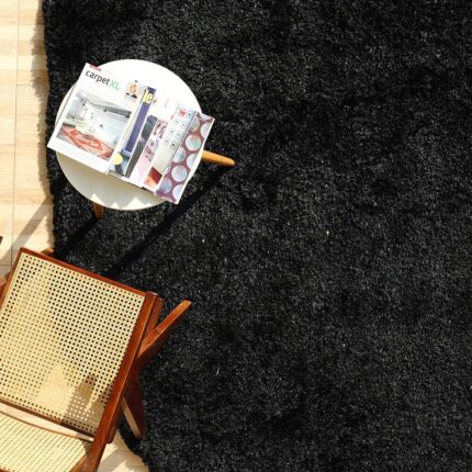 Handmade wool rug with soft white fur shag texture, adding warmth and luxury to living room or bedroom décor in Dubai and across UAE.