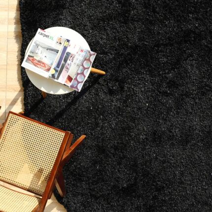 Handmade wool rug with soft white fur shag texture, adding warmth and luxury to living room or bedroom décor in Dubai and across UAE.