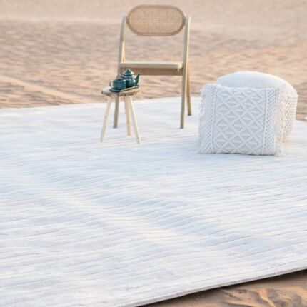 Handmade rugs Dubai including tufted rugs, dining table rugs, and outdoor rugs for modern floorings
