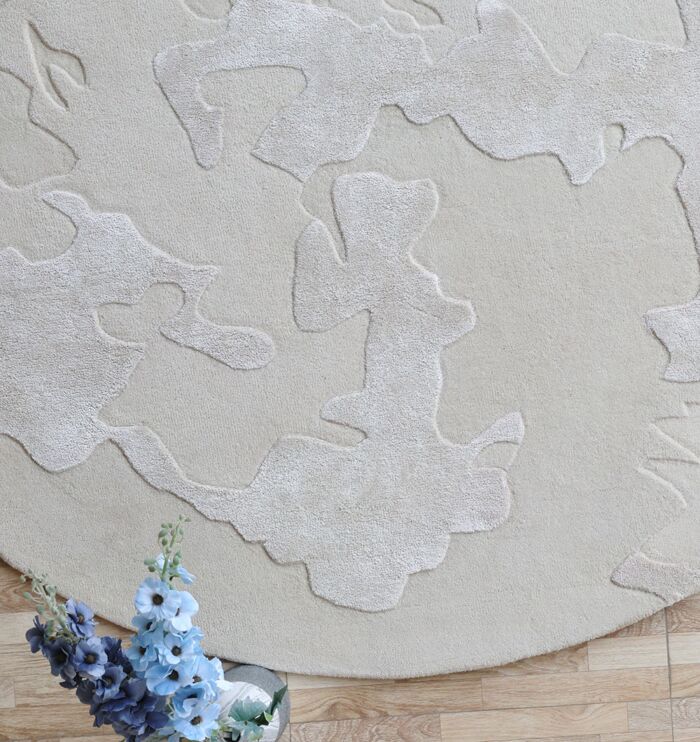 Elegant handmade circular carpet in Dubai, stylish tufted rug for living room and bedroom, available in UAE homes.