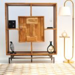 Modern bookshelf with 1 door and iron stand by Ramsha Home رمشا المنزل for stylish home interiors