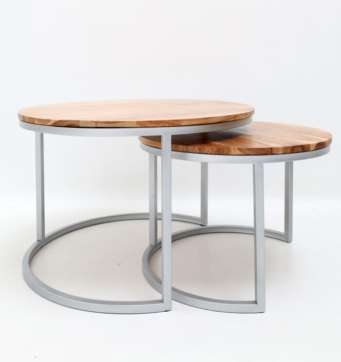 Upgrade your living room with a modern nesting coffee table set, crafted with a round wooden top and sleek silver metal frame for elegance and durability.