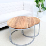 Modern nesting coffee table set with round wooden top and silver metal frame