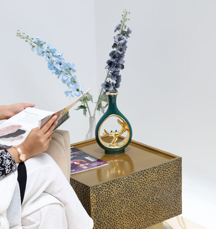 Luxury golden iron side table adding elegance to home decor