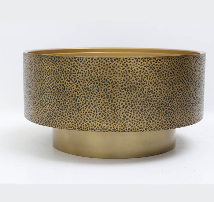 Angled side view of round iron side table with textured golden antique design GH-090