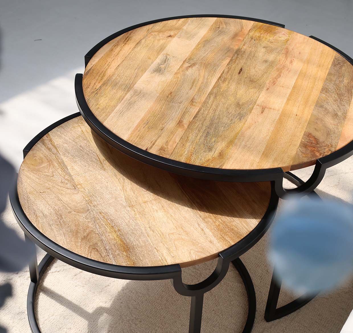 Top View – Modern Nesting Coffee Table Set GH-001 Top view of modern nesting coffee table set with round wooden tops and metal frame GH-001