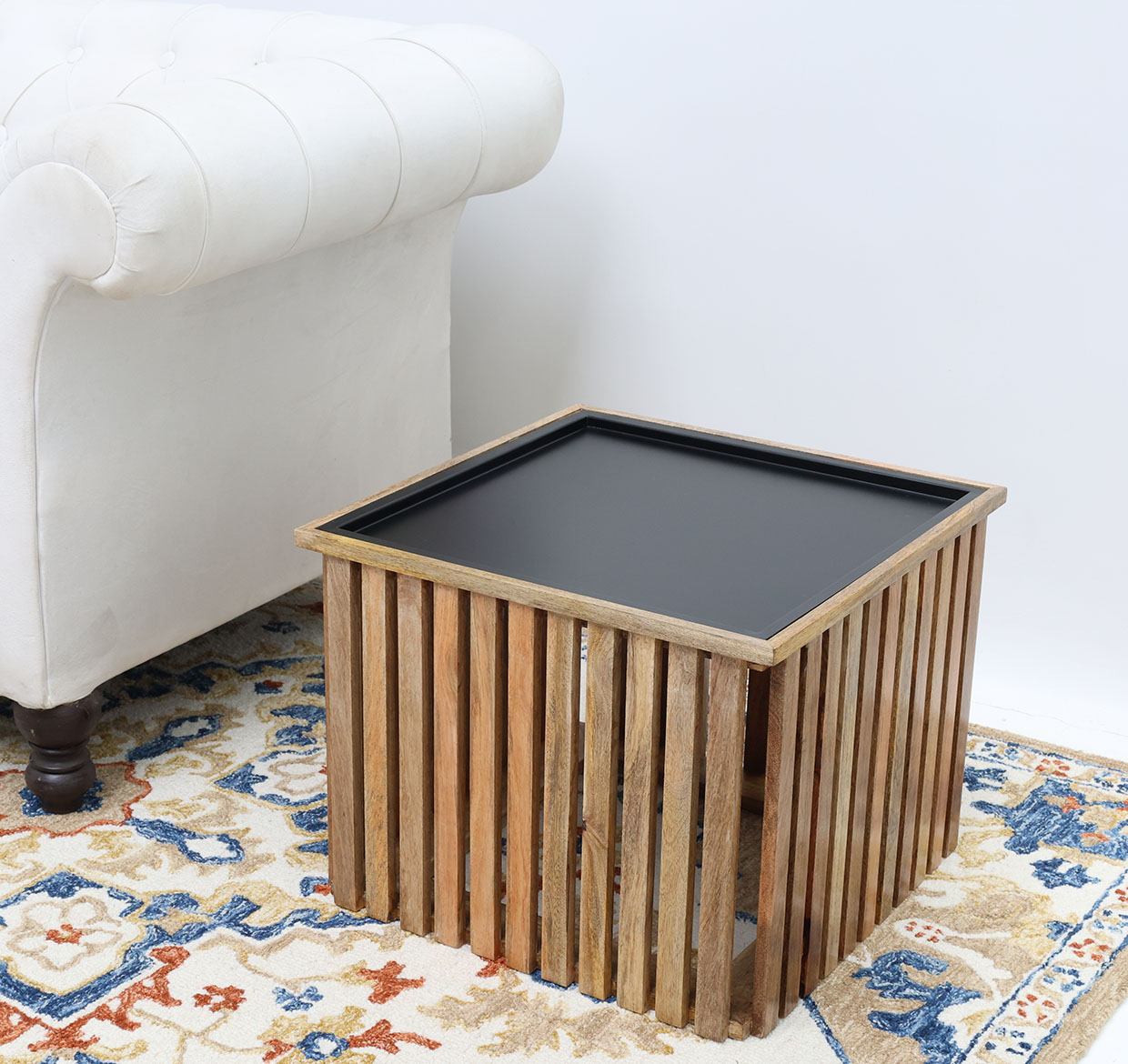 Close-Up Inclined Top View – Modern Wooden & Iron Coffee Table GH-99 Close-up inclined top view of modern square slatted wooden coffee table GH-99