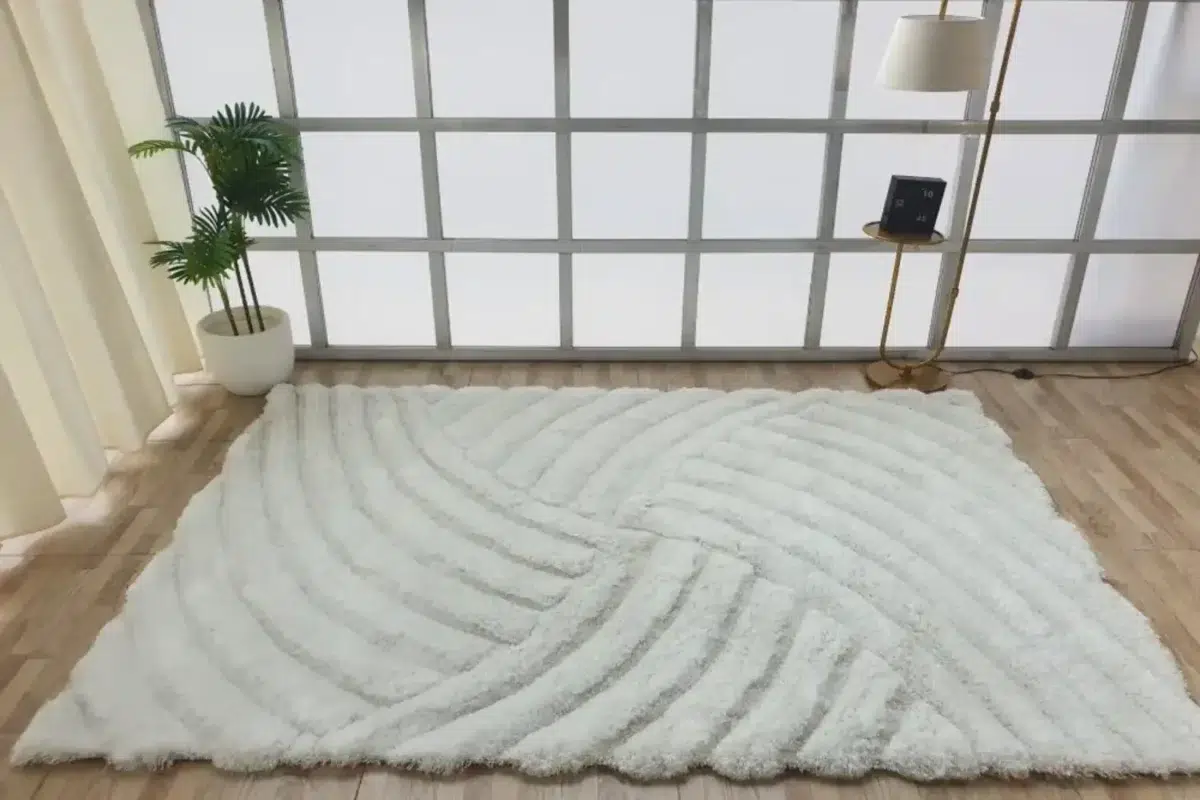 White shaggy rug in modern home décor setting, available at Ramsha Home online
