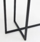 Modern rectangular coffee table with natural wood top and sturdy black iron stand – minimalist industrial design