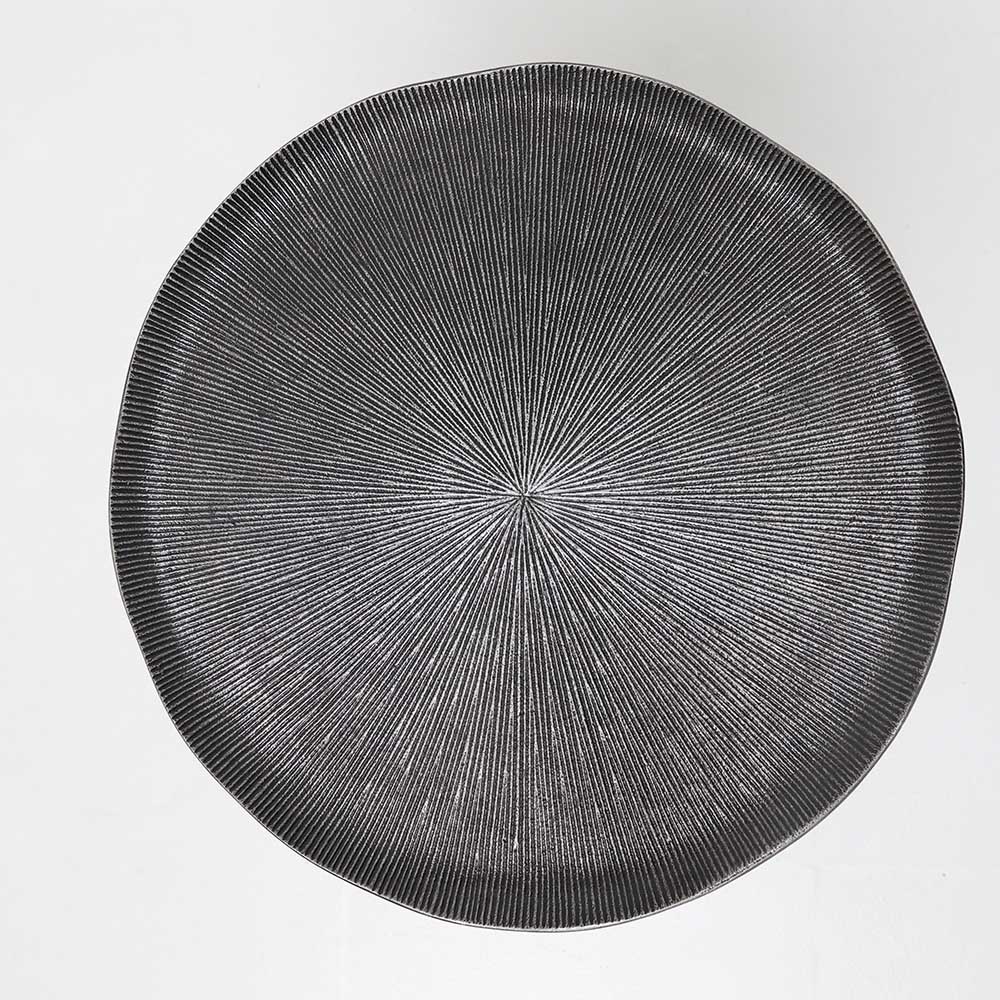 Top View – Modern Black Metal Side Table with Textured Round Surface Top view of modern black metal side table showing textured round surface and matte finish
