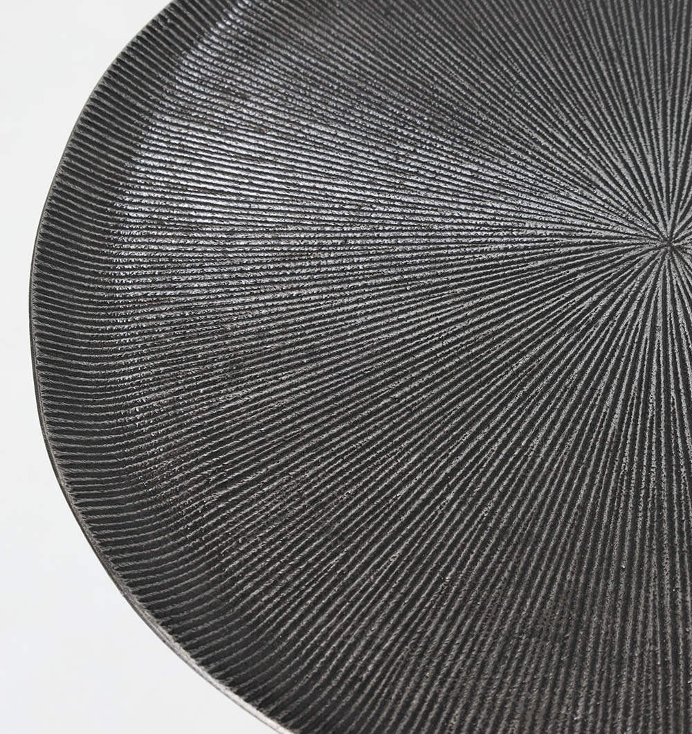 Top Close-Up – Modern Black Metal Side Table with Textured Round Surface Close-up top view of modern black metal side table showing textured surface and matte finish