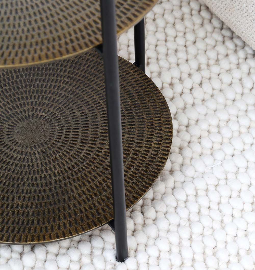 Round Coffee Table Close-Up – Textured Wood Surface & Black Iron Base Close-up of round coffee table showing textured wood top and black iron base details