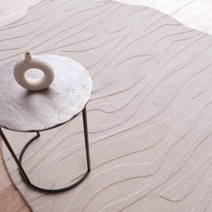 Off White Color Decor Rug HTWV 115 with coffee table on top – handwoven wool-cotton rug in living room