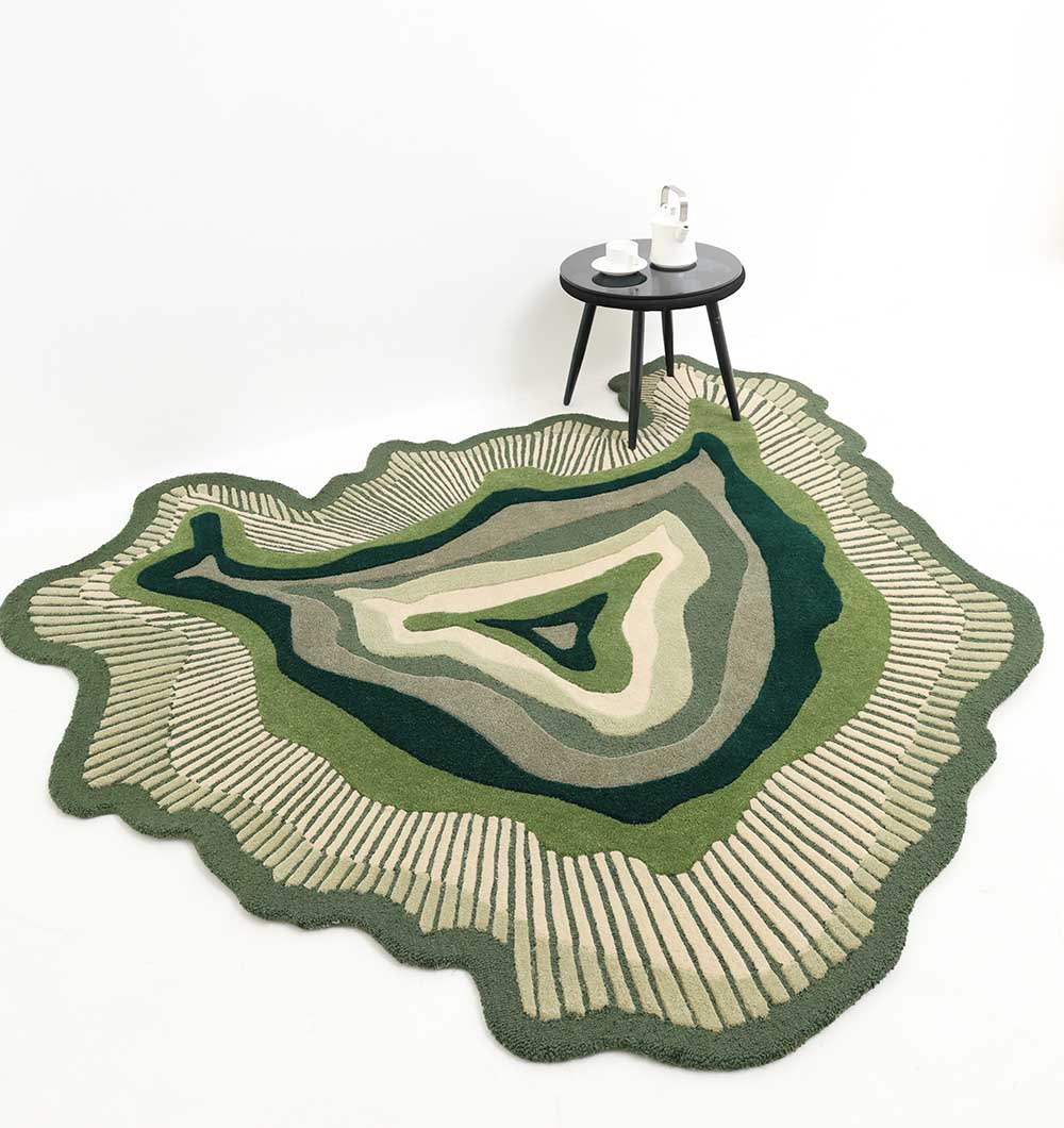 Organic Green Shaped Rug - HTW 123 (200cm) An Organic Green Shaped Rug featuring layered concentric circles in forest green, sage, and cream with a textured hand-carved border.